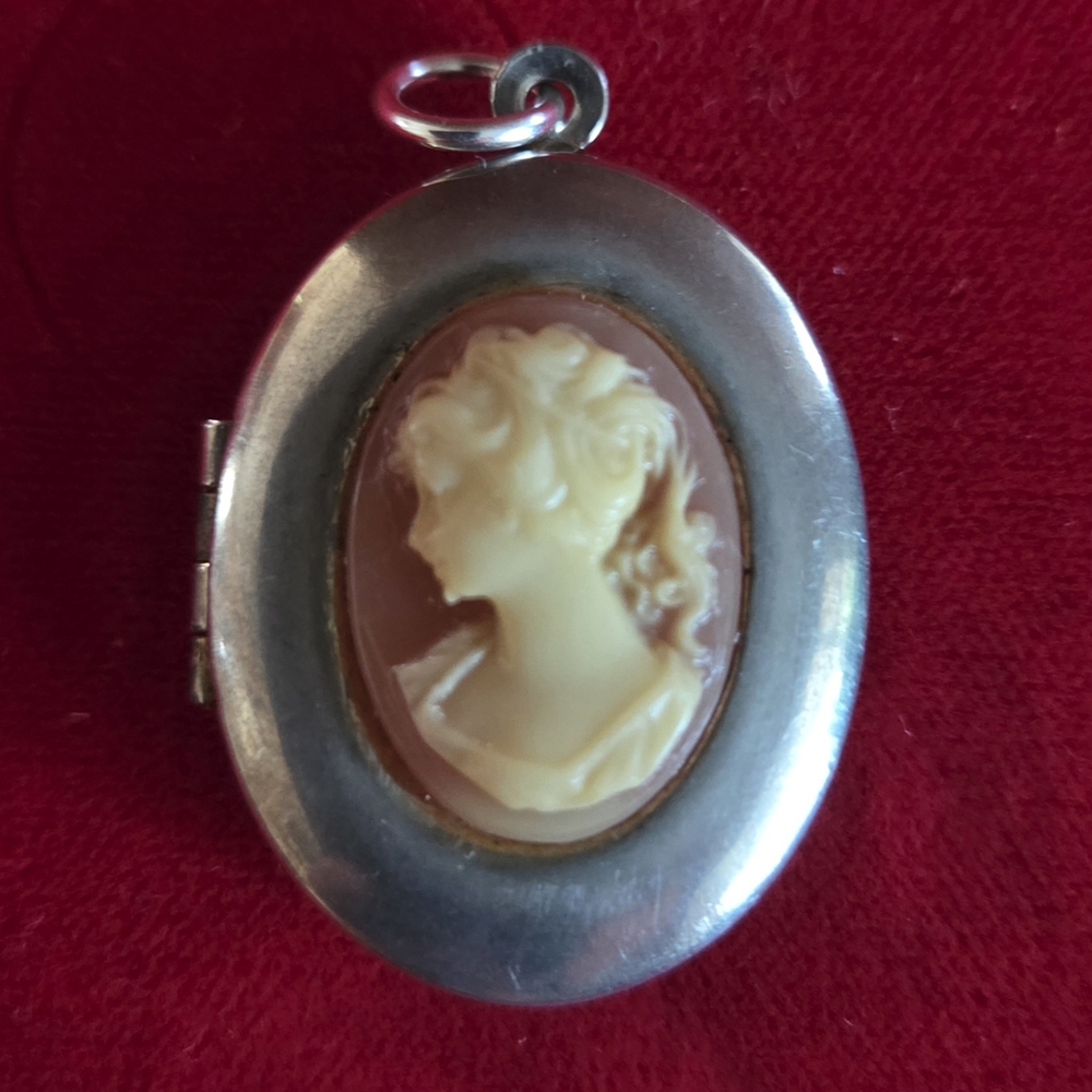 Elegant Silver and Cream Cameo Locket Pendant